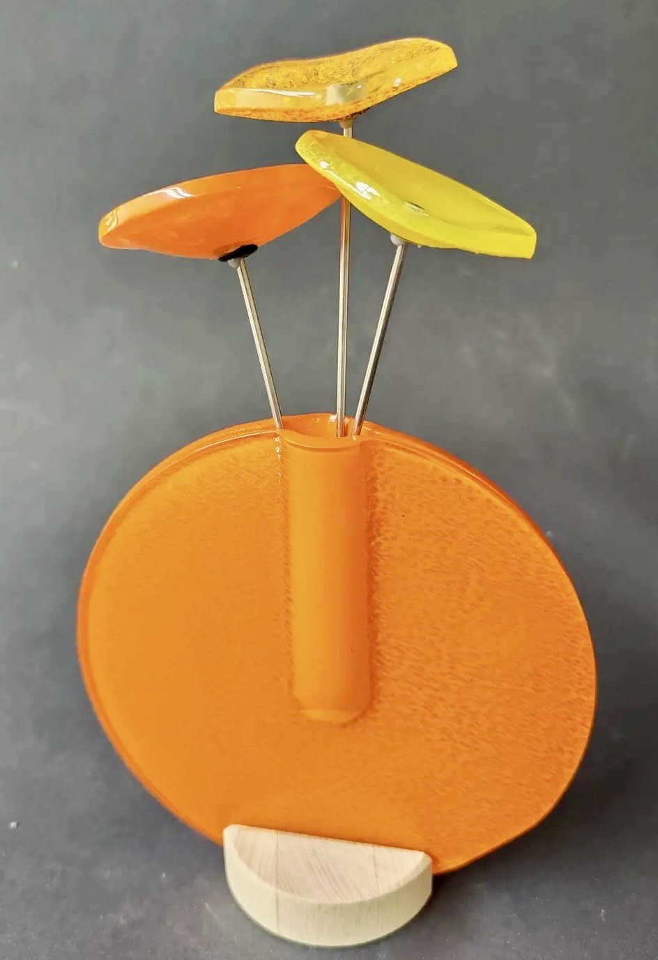 Modern glass flowers in vase in multiple colours