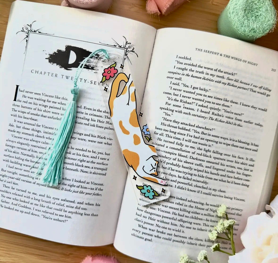 Glass like acrylic book marks in 7 different designs with silk tassels