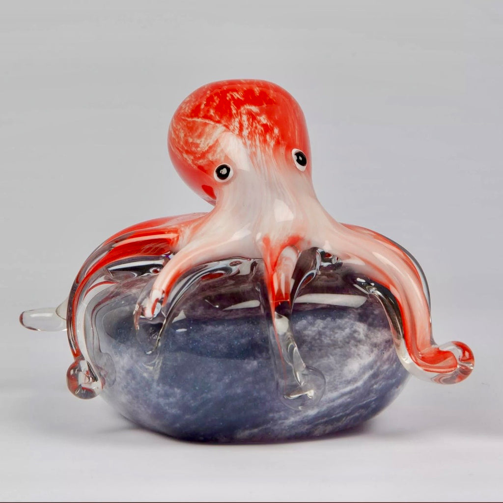Pink glass Octopus on beach stone
