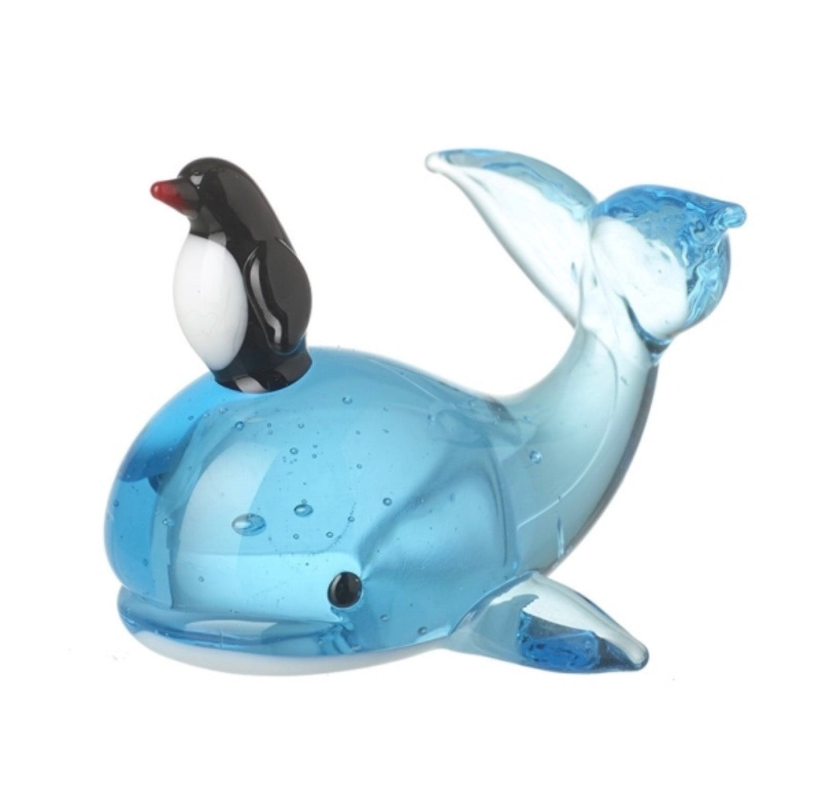 Glass whale with penguin