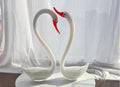 Beautiful hand blown pair of white swans